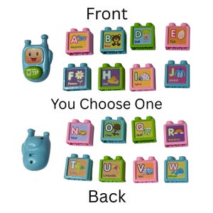 May include: A collection of brightly coloured alphabet blocks with matching pictures, and a blue toy phone. Each block displays a letter and an image, like an airplane, bear, and doll. The text "You Choose One" is also visible.