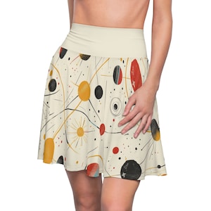 May include: A white skater skirt with a colorful abstract print featuring black, red, yellow, and blue circles and lines. The skirt has a high waist and a flared silhouette.