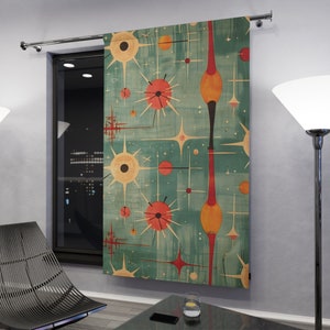 May include: A teal blue curtain with a mid-century modern design featuring abstract shapes in shades of orange, red, and yellow. The design is reminiscent of a starry night sky.
