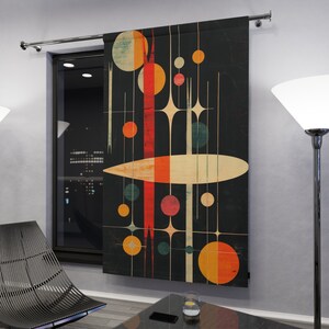 May include: A mid-century modern style tapestry featuring abstract shapes and colors on a black background. The tapestry features a large, white, oval shape with a red and orange stripe pattern. There are also several smaller circles in various colors, including red, orange, yellow, green, and blue.