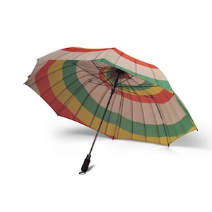 May include: An open umbrella with a colorful striped pattern in red, yellow, green, and tan. The umbrella has a black handle and frame. The design is a classic, cheerful style, suitable for sun or rain protection.