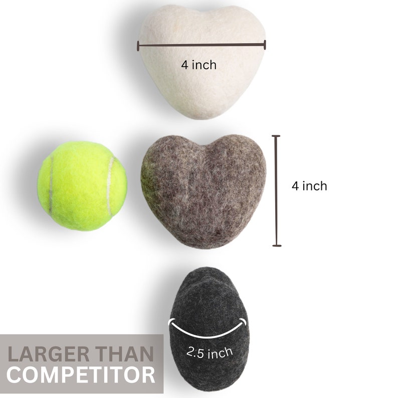 May include: Three felt heart-shaped dog toys in white, brown, and black. The white and brown hearts measure 4 inches in diameter. The black heart measures 2.5 inches in diameter. The text "LARGER THAN COMPETITOR" is visible in the image.