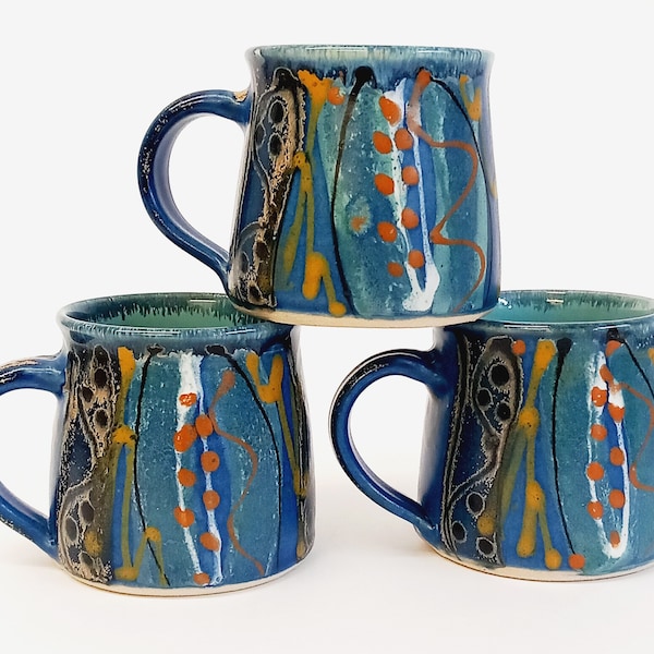 Unique handmade stoneware mug, perfect gift for coffee lovers. Deep midnight blue satin glaze exterior, fresh glossy turquoise inside.