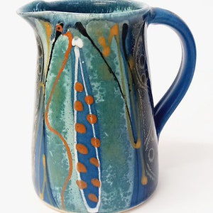 Unique handmade stoneware jug, around 15cm tall. Deep midnight blue satin glaze exterior, fresh glossy turquoise inside. Ideal gift. image 2