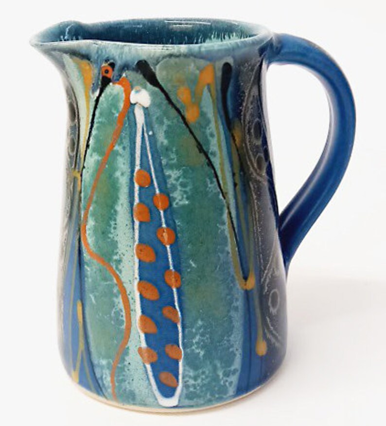 Unique handmade stoneware jug, around 15cm tall. Deep midnight blue satin glaze exterior, fresh glossy turquoise inside. Ideal gift. image 2