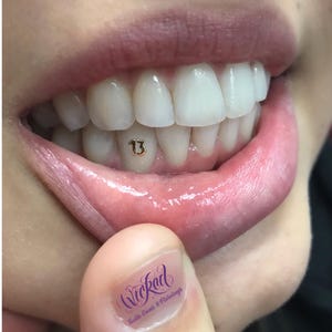 Lucky 13 tooth gem