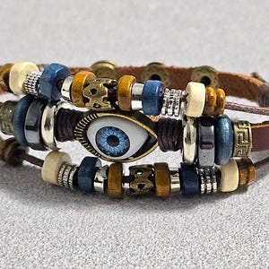 Pulsera de ojo malvado para hombre, estilo bohemio e hippie, pulsera surfera, pulsera de cuero bohemio, nudo de ancla, pulsera de cuentas de varias hebras, regalo para él