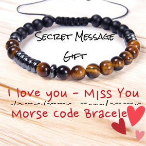 May include: A brown and black beaded bracelet with a secret message in Morse code. The message reads "I love you - Miss You".