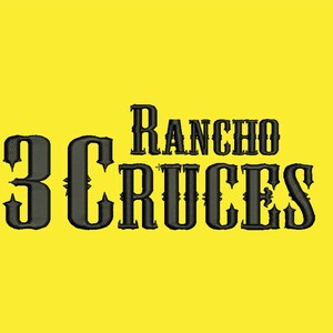 May include: Black and white logo with the text "Rancho 3 Cruces" in a stylized western font.