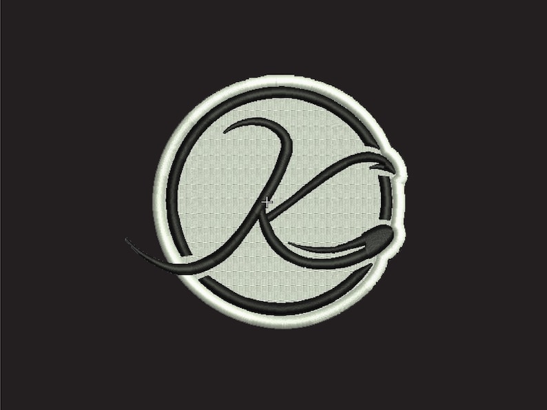 May include: A black and white embroidered patch with a stylized letter "K" inside a white circle with a black outline.