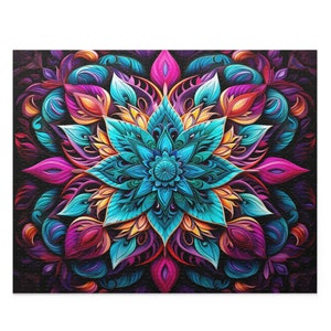 May include: A colorful mandala design with intricate details in shades of blue, purple, pink, yellow, and orange. The mandala is surrounded by a black background.