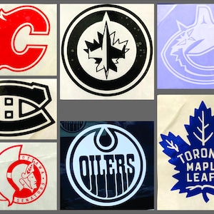 May include: A collage of hockey team logos, including the Calgary Flames, Montreal Canadiens, Winnipeg Jets, Vancouver Canucks, Ottawa Senators, Edmonton Oilers, and Toronto Maple Leafs. Each logo is a distinct design.