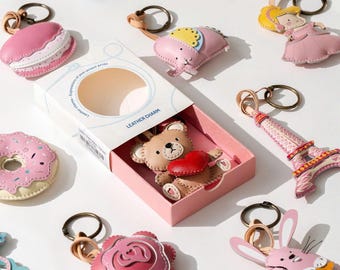 Pink Collection Bag Charm – New York–Inspired Vegan Leather Keychain with Taxi, Airplane, Purse & Backpack Accessory
