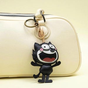 手作りのレザー製ロケット型バッグチャーム：ユニークなキーホルダーギフト Felix the Cat