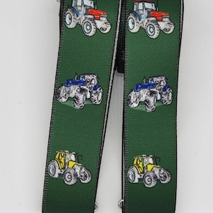 Suspenders 35 mm wide with strong clips, green with tractor design