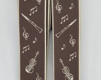 Bretels 35 mm breed met sterke clips, geweven band in muziekdesign