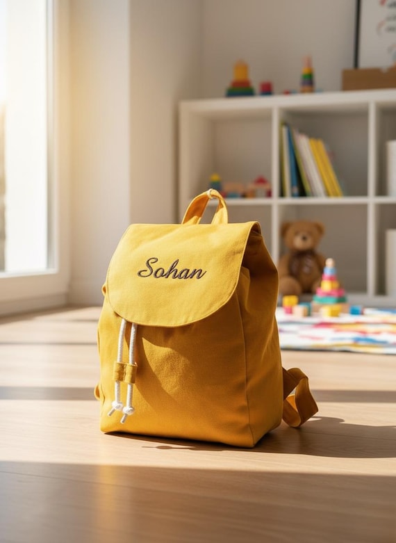 customizable mini backpack Teddy 22.75in Details Signature lightweight nylon Adjustable padded straps Gold metal hardware Top zip closure Front zip pocket Fully lined Sigma Clear Mini Backpack