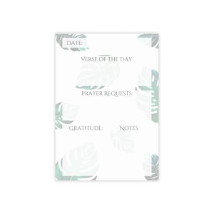 May include: A printable journal page with a tropical leaf design. The page includes sections for the date, verse of the day, prayer requests, gratitude, and notes.