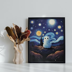 May include: A framed print of a starry night sky with a white ghost in the center. The ghost has a smiling face and is sitting on a hill. The sky is blue with yellow stars and a swirling blue and white pattern.