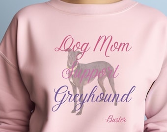 May include: Pink sweatshirt with a greyhound silhouette and the text "Dog Mom Support Greyhound -Buster".