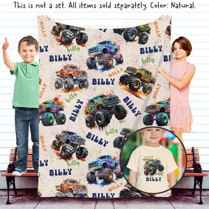 May include: A cream-colored fleece blanket with a repeating pattern of colorful monster trucks. The trucks are decorated with paint splatters and the name "Billy" is printed on each truck. The text "This is not a set. All items sold separately. Color: Natural." is printed at the top of the blanket.