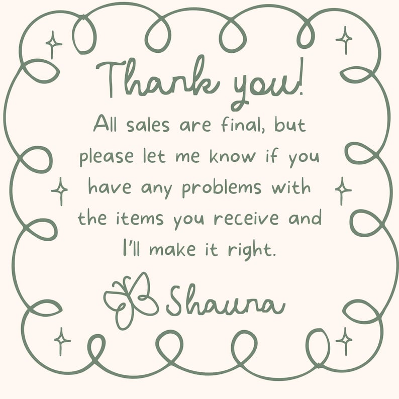 May include: A cream-colored card with a green border and text that reads "Thank you!" and other text. The card also includes the name "Shauna" and a butterfly illustration.