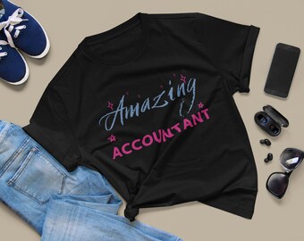 May include: Black t-shirt with the text "Amazing Accountant" in pink and blue lettering with stars.