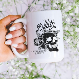 May include: White ceramic mug with a black skull and rose design, and the text "'til Death". The mug also includes the names "Kirsten & Hunter" and the date "II.V.MMXVI".