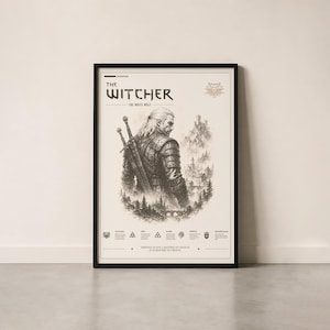 May include: Framed art print featuring a sepia-toned illustration of a man with long white hair and two swords on his back, from "The Witcher." The print includes the title "The Witcher" and the phrase "The White Wolf."