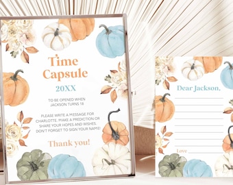 Może przedstawiać: Oprawiony znak kapsuły czasu i pasująca karta. Na znaku widnieje napis "Time Capsule 20XX" z tekstem o pisaniu wiadomości. Projekt przedstawia akwarelowe dynie w kolorze pomarańczowym, białym, zielonym i niebieskim z kwiatowymi akcentami.