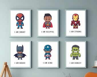 May include: Six framed prints featuring cartoon superheroes with positive affirmations. Each print has a different superhero, including Spiderman, Superman, Iron Man, Batman, Captain America, and the Hulk. The prints are displayed on a light blue wall with a wooden shelf and a brown armchair.
