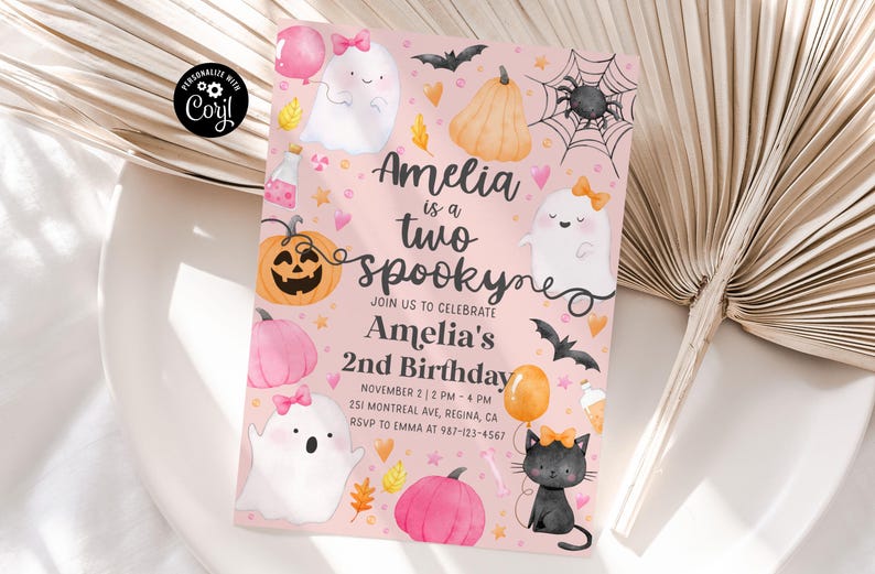 May include: A pink Halloween-themed birthday invitation with the text "Amelia is a two spookyne". The invitation features illustrations of ghosts, pumpkins, bats, and a black cat. The invitation also includes the date, time, and location of the party.