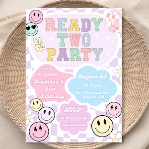 May include: A purple and white checkered background with a pink, blue, and green cloud with the text "READY TWO PARTY" in rainbow letters. The invitation is for Madison's 2nd birthday party on August 25th from 12-3 pm at 257 Montreal Ave, Regina, SK. The RSVP information is to Emma at 982-123-4562.