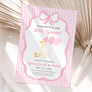 May include: Pink and white gingham patterned invitation with a white goose wearing a pink party hat and holding pink balloons. The text reads "Charlotte is one Silly Goose!" and includes details for a birthday party.