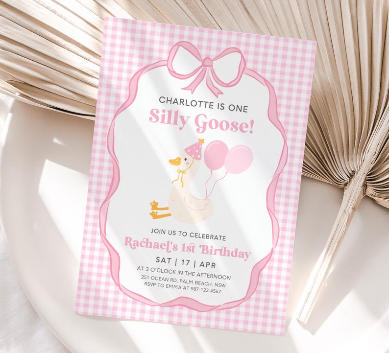 May include: Pink and white gingham patterned invitation with a white goose wearing a pink party hat and holding pink balloons. The text reads "Charlotte is one Silly Goose!" and includes details for a birthday party.