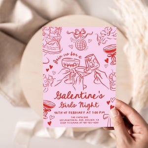May include: Pink invitation card with red text and illustrations. The text reads "Join us for a Galentine's Girls Night 14th of February at 1:00 PM The Caps Bar 151 Mintreal Ave, Regina, CA RSVP to Emma at 437-123-4567".