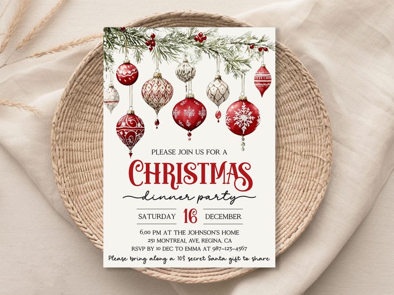 May include: A Christmas dinner party invitation with a red and white watercolor design of ornaments hanging from a pine branch. The text reads "Please join us for a Christmas dinner party, Saturday 16 December, 6:00 PM at the Johnson's Home, 251 Montreal Ave, Regina, CA, RSVP by 10 Dec to Emma at 987-123-4567, Please bring along a 10$ secret Santa gift to share."