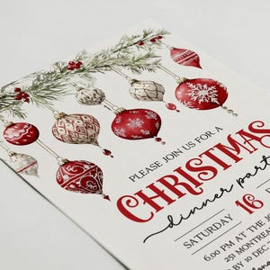 May include: A Christmas dinner party invitation with a red and white color scheme. The invitation features a watercolor illustration of red and white ornaments hanging from a pine branch. The text on the invitation reads "Please join us for a Christmas dinner party, Saturday 16 December, 6:00 PM at the Johnson's Home, 251 Montreal Ave, Regina, CA. By 10 Dec to Emma at 987-123."