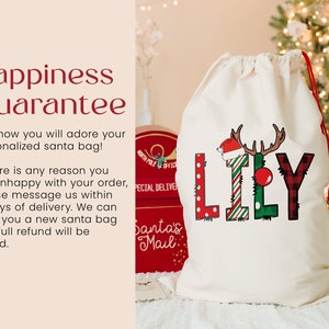 a bag with a christmas message on it next to a christmas tree