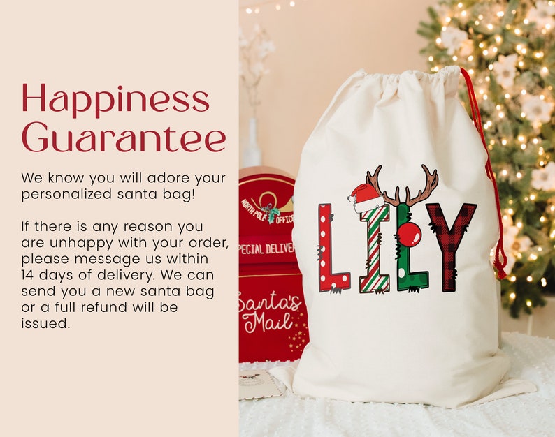 a bag with a christmas message on it next to a christmas tree