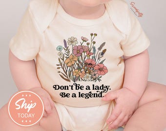 Don't Be A Lady Be A Legend Onesies® Brand, Wildflower Baby Bodysuit, Feminist Baby Shower Gift, Female Empowerment Baby Outfit, (KA-WOM55)
