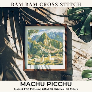 May include: A framed cross stitch pattern titled BAM BAM CROSS STITCH MACHU PICCHU. The image depicts a landscape of Machu Picchu with two white llamas in the foreground, rendered in 37 colors. The pattern is 200x200 stitches, provided as a PDF.
