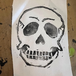 Skull block print patch on canvas material