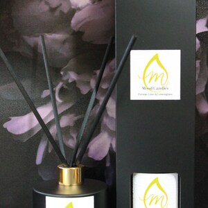 May include: Black diffuser bottle with gold lid and black sticks. The bottle has a white label with a gold drop and the text "Mood Candles" and "Persian Lime & Lemongrass".