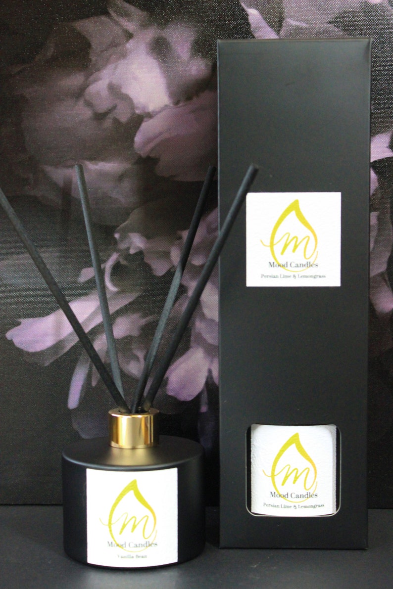 May include: Black diffuser bottle with gold lid and black sticks. The bottle has a white label with a gold drop and the text "Mood Candles" and "Persian Lime & Lemongrass".