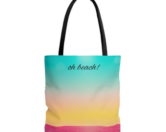 Może przedstawiać: Torba typu tote z kolorowym wzorem zachodu słońca i nadrukiem "oh beach!" z przodu.