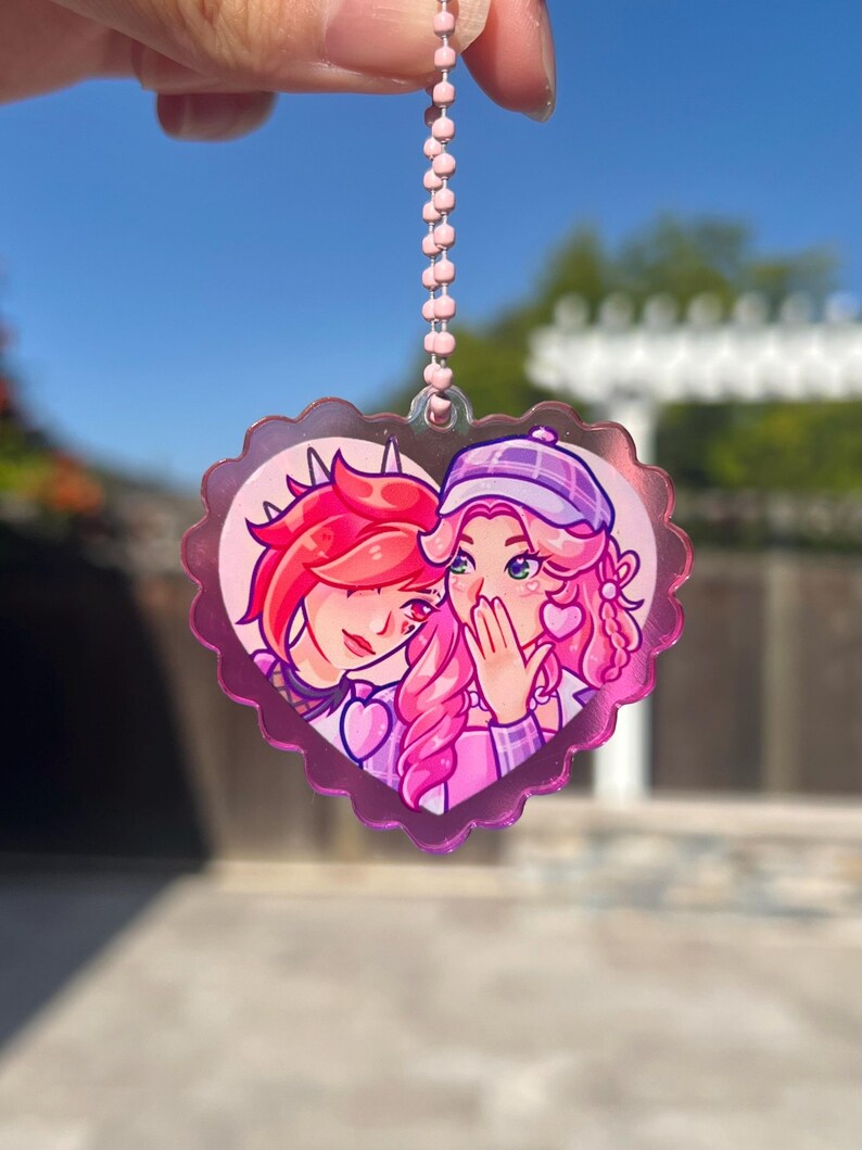 LEAGUE HEART KEYCHAINS // Lightcannon Lux Jinx Jhin Hwei Neeko Nidalee Leona Diana Caitvi Caitlyn Vi Xayah Rakan LoL League of Legends image 3
