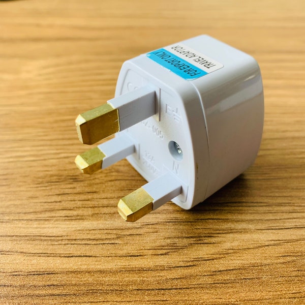 Uk plug connecteur Universal Us Eu Au Converter UK AC Travel Wall Plug Chargeur Adaptateur ANGLETERRE Irlande Singapour Malaisie Inde