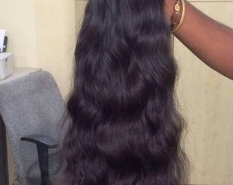 Raw Indian Body Wave Human Hair Wefts from India.