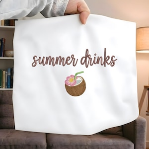 May include: A white ceramic mug with a black handle and the text "But First, Coffee" in a black, bold font. The mug is sitting on a white surface. The mug appears to be 12 ounces.
